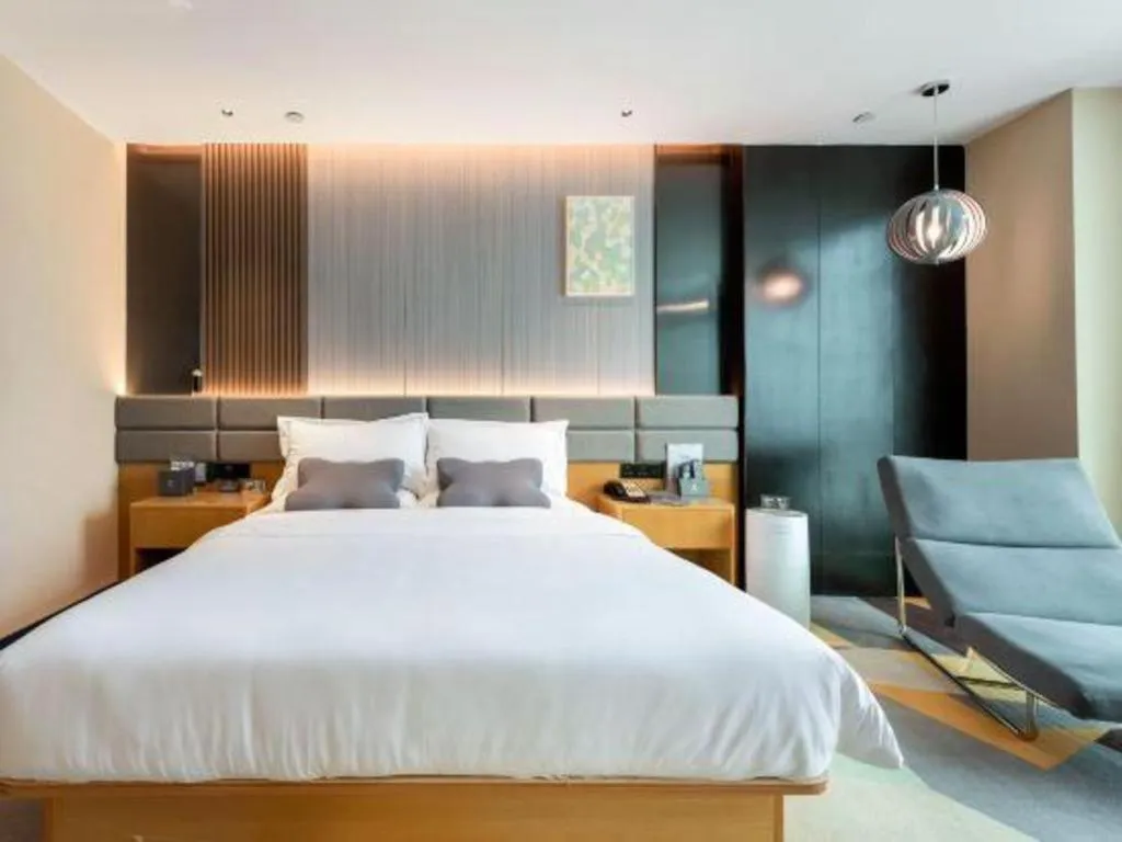 Bed in Chonpines Hotel Guangzhou Sunac Cultural and Tourism City Shiling