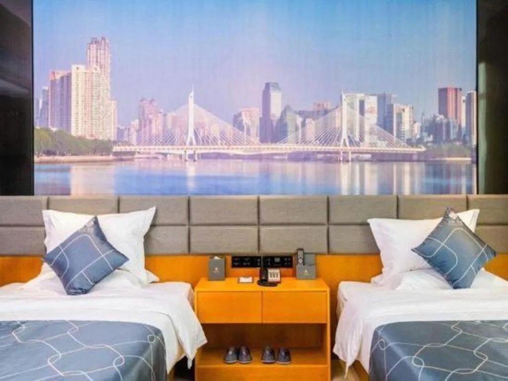 Bed in Chonpines Hotel Guangzhou Sunac Cultural and Tourism City Shiling