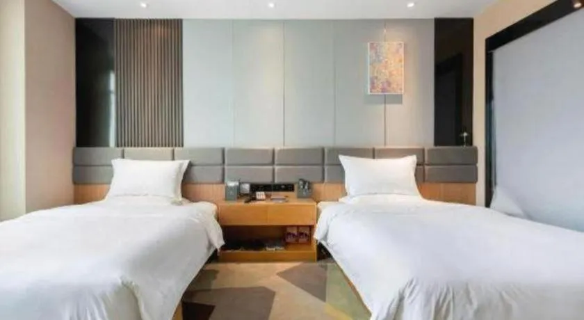 Bed in Chonpines Hotel Guangzhou Sunac Cultural and Tourism City Shiling