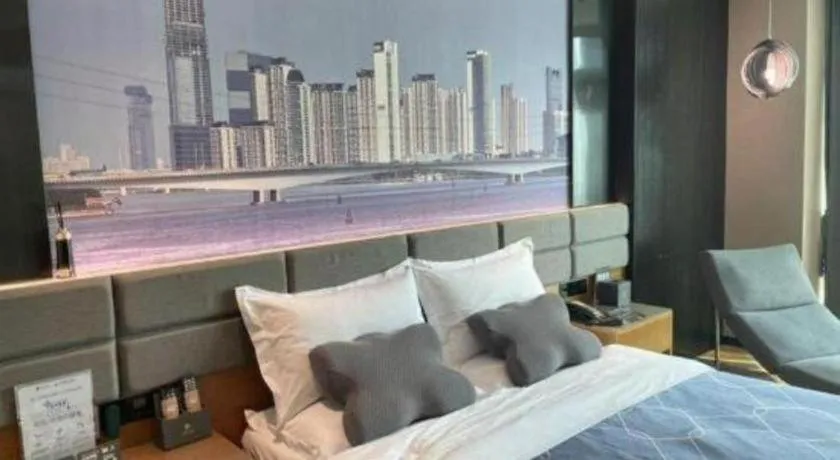 Bed in Chonpines Hotel Guangzhou Sunac Cultural and Tourism City Shiling