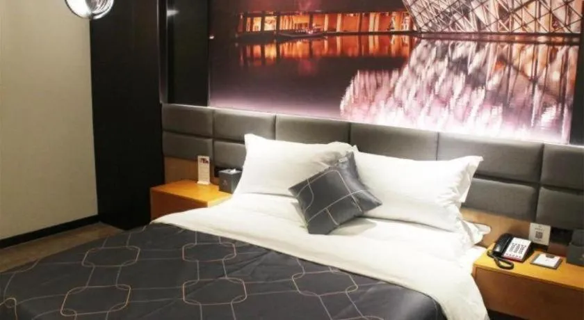 Bed in Chonpines Hotel Guangzhou Sunac Cultural and Tourism City Shiling