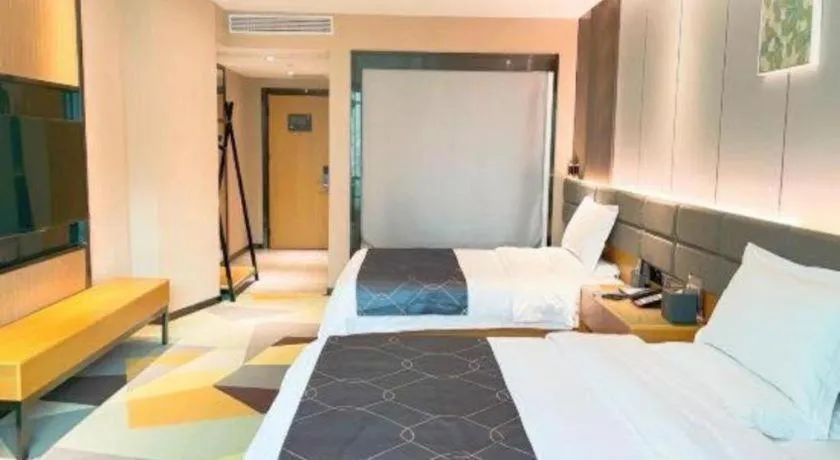 Bed in Chonpines Hotel Guangzhou Sunac Cultural and Tourism City Shiling