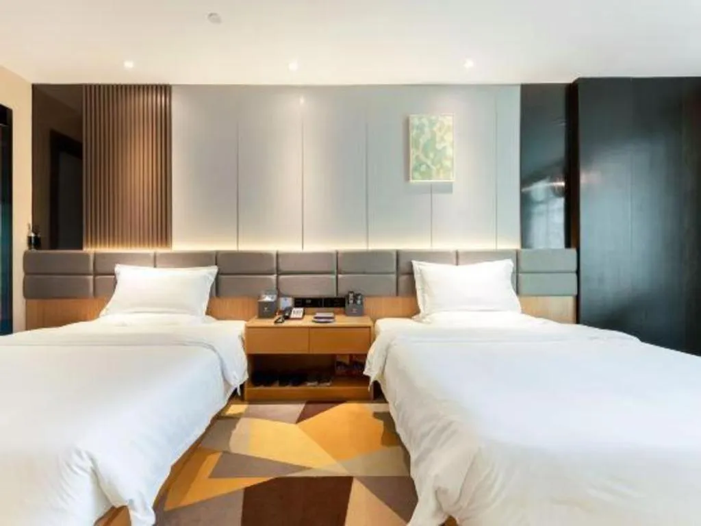 Bed in Chonpines Hotel Guangzhou Sunac Cultural and Tourism City Shiling