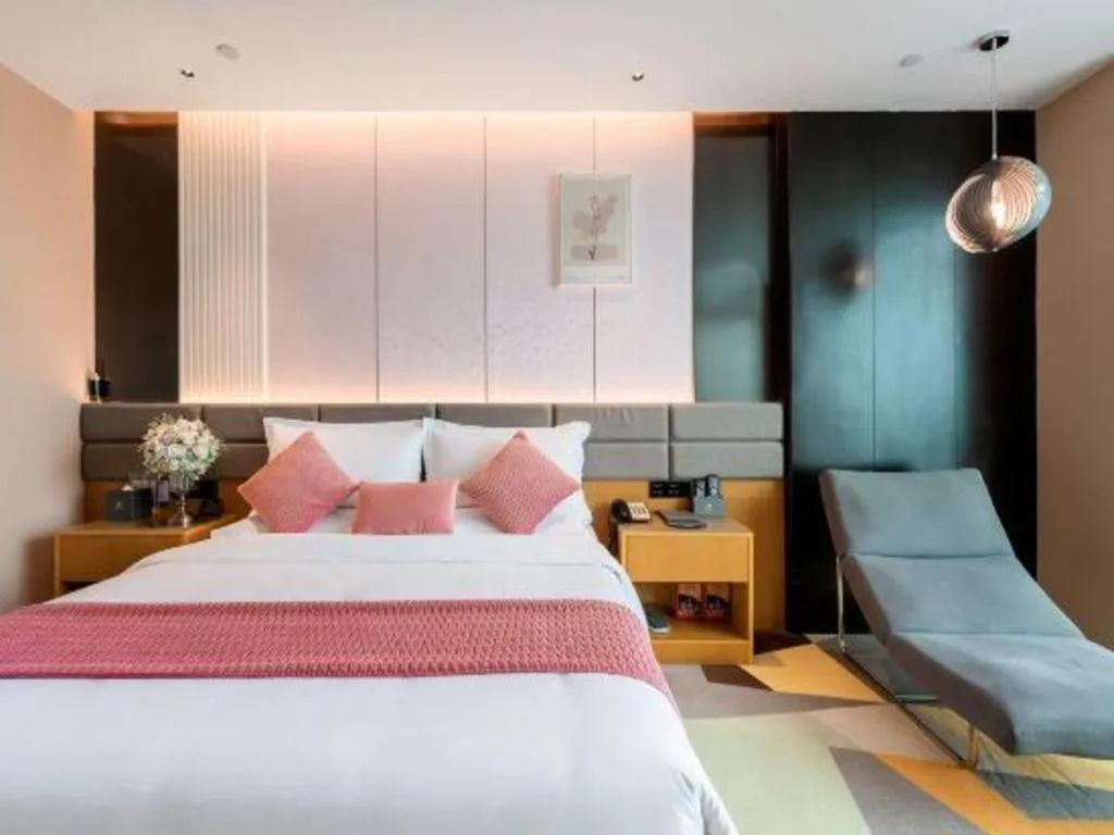Bed in Chonpines Hotel Guangzhou Sunac Cultural and Tourism City Shiling