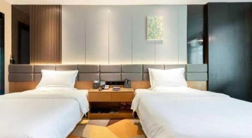 Bed in Chonpines Hotel Guangzhou Sunac Cultural and Tourism City Shiling