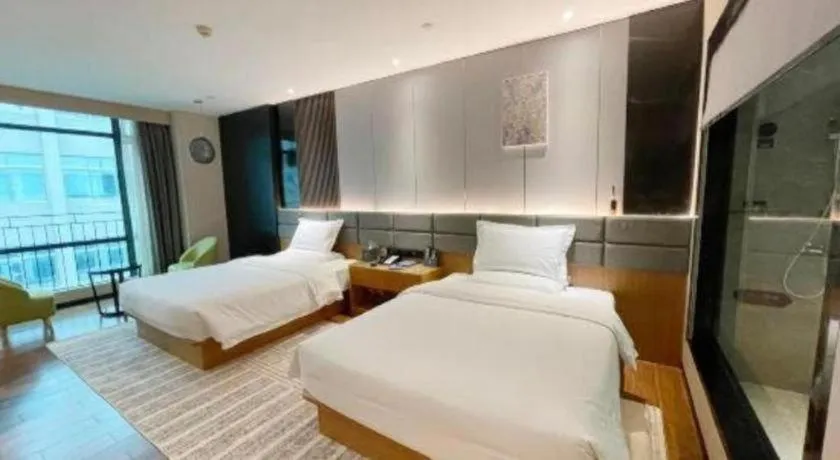 Bed in Chonpines Hotel Guangzhou Sunac Cultural and Tourism City Shiling