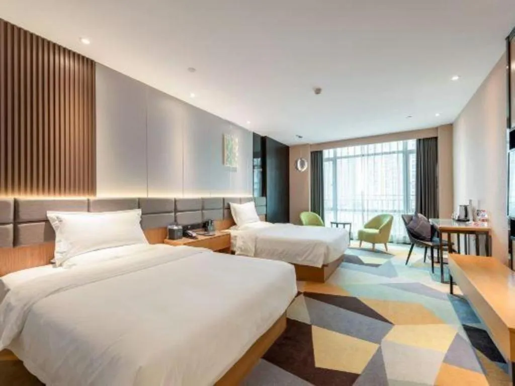 Bed in Chonpines Hotel Guangzhou Sunac Cultural and Tourism City Shiling