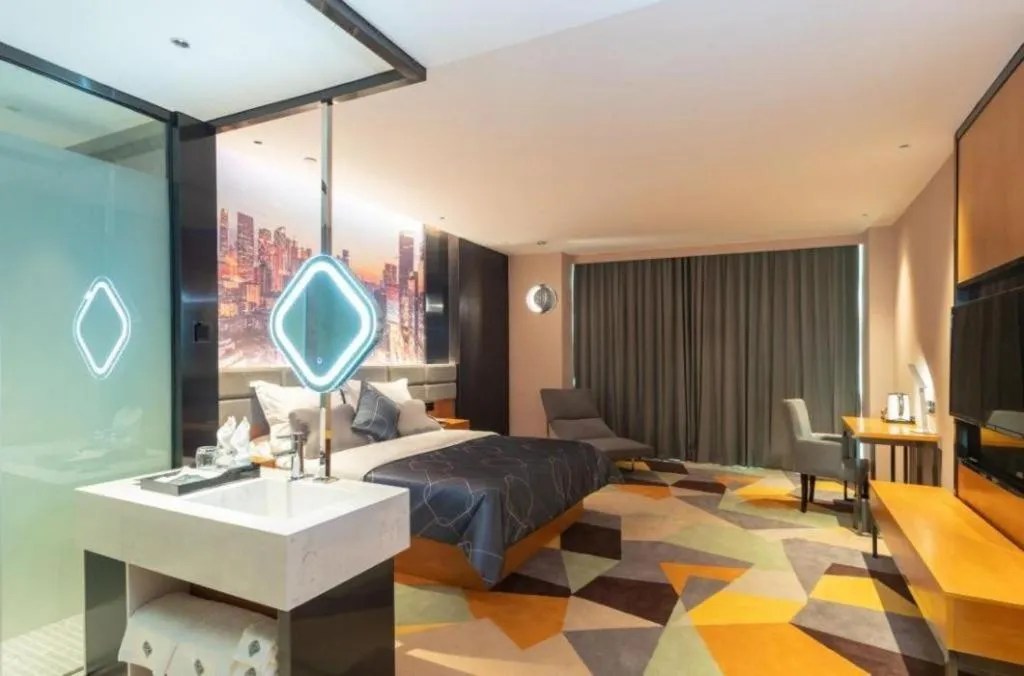 Bed in Chonpines Hotel Guangzhou Sunac Cultural and Tourism City Shiling