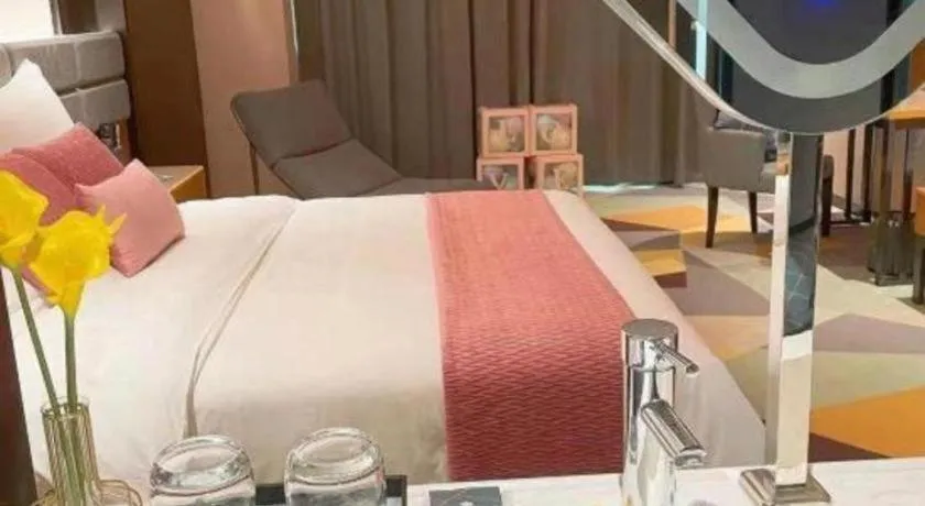 Bed in Chonpines Hotel Guangzhou Sunac Cultural and Tourism City Shiling