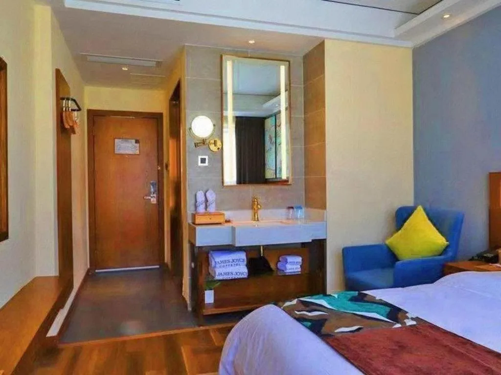 Bed in James Joyce Coffetel Guangyuan High-Speed Railway Station Dongba Municipal Government