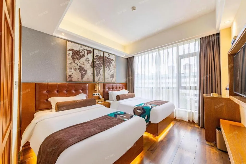 Bed in James Joyce Coffetel Guangyuan High-Speed Railway Station Dongba Municipal Government