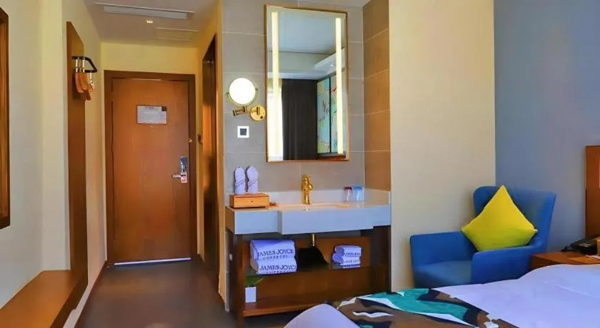 Bed in James Joyce Coffetel Guangyuan High-Speed Railway Station Dongba Municipal Government