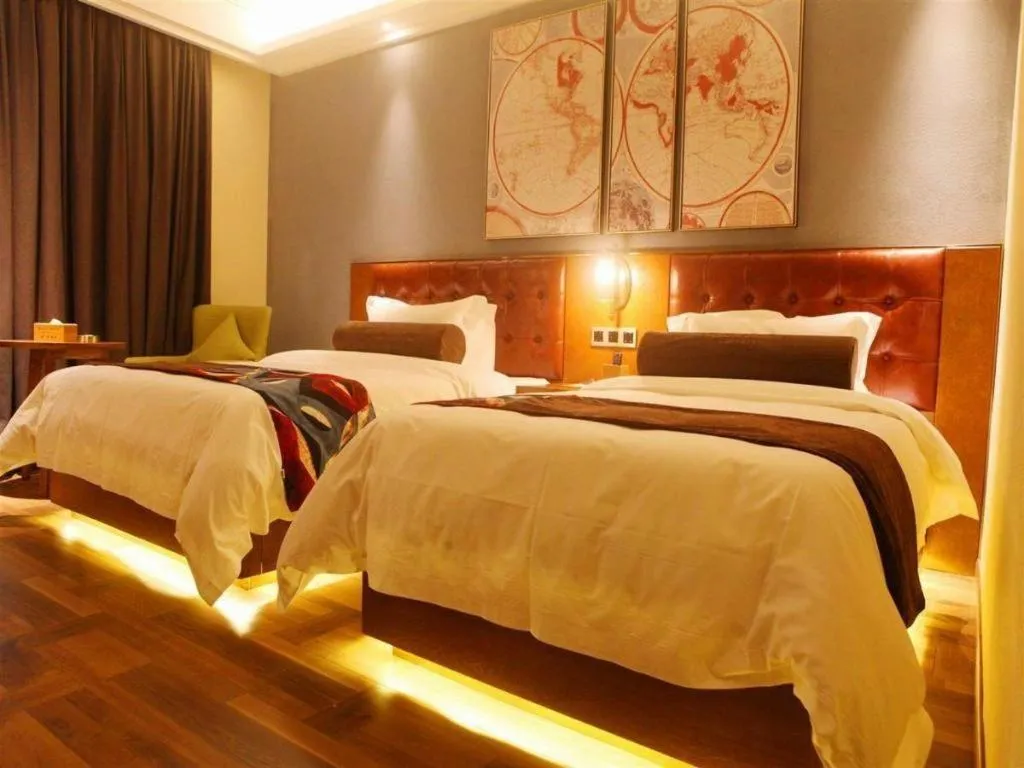 Bed in James Joyce Coffetel Guangyuan High-Speed Railway Station Dongba Municipal Government