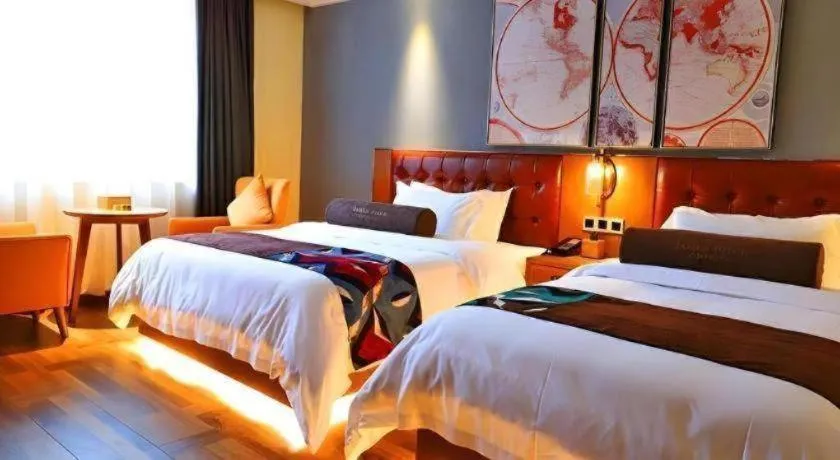 Bed in James Joyce Coffetel Guangyuan High-Speed Railway Station Dongba Municipal Government