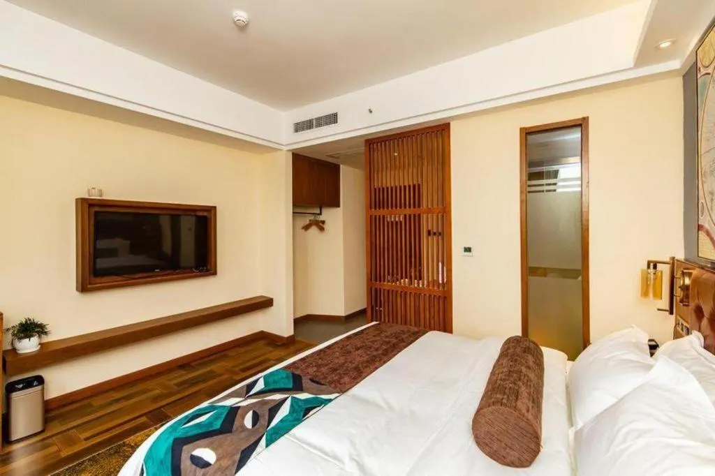 Bed in James Joyce Coffetel Guangyuan High-Speed Railway Station Dongba Municipal Government