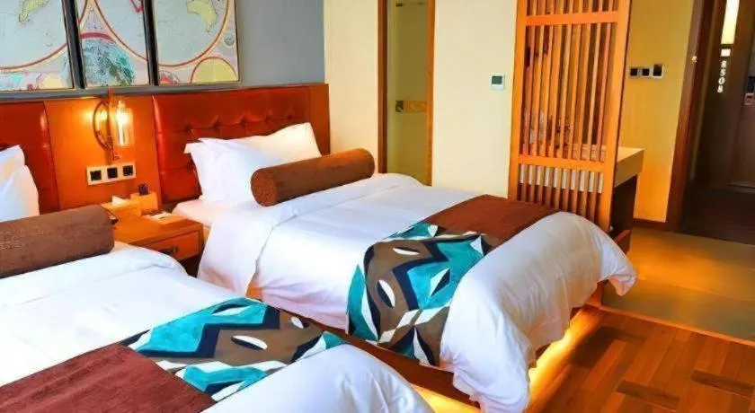 Bed in James Joyce Coffetel Guangyuan High-Speed Railway Station Dongba Municipal Government