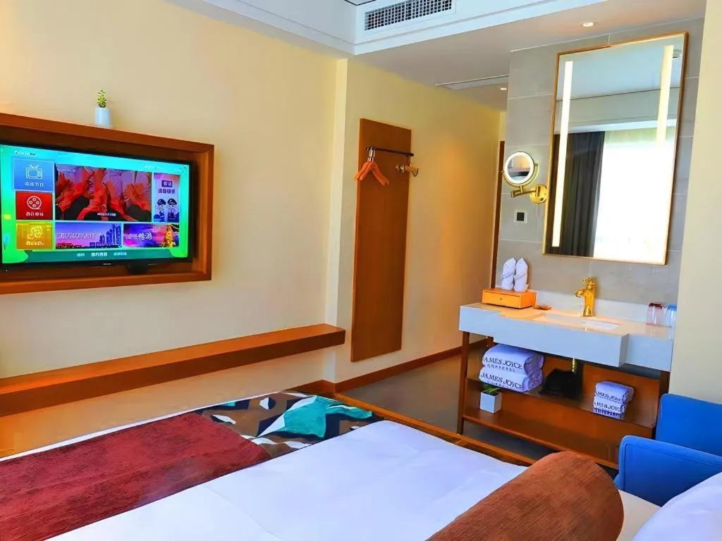 Bed in James Joyce Coffetel Guangyuan High-Speed Railway Station Dongba Municipal Government