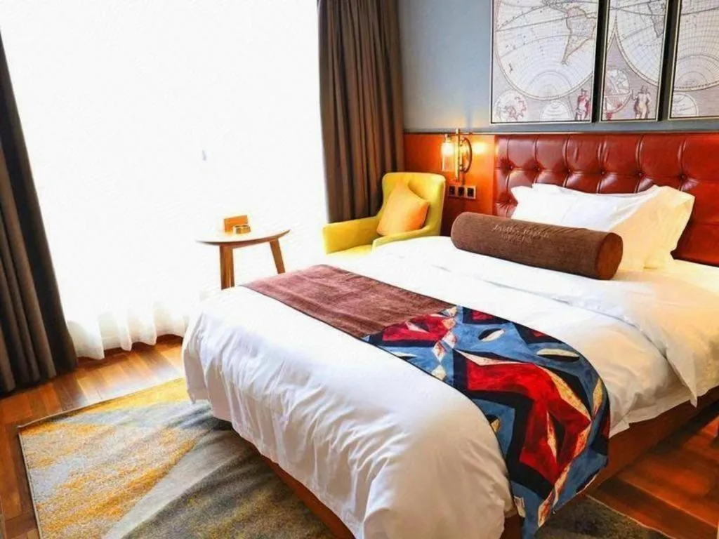 Bed in James Joyce Coffetel Guangyuan High-Speed Railway Station Dongba Municipal Government