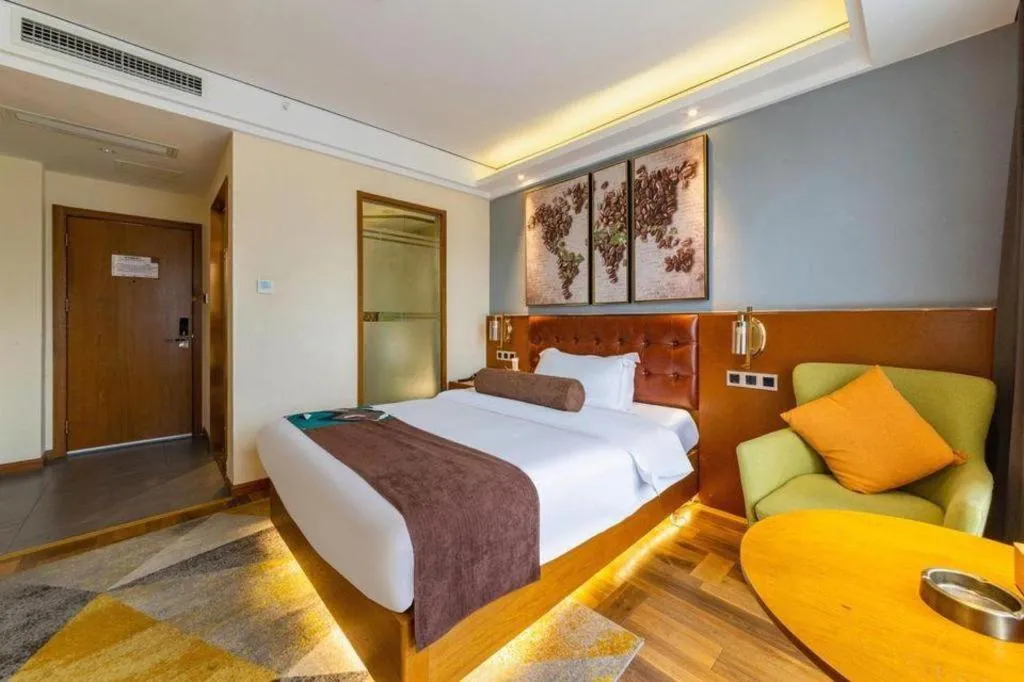 Bed in James Joyce Coffetel Guangyuan High-Speed Railway Station Dongba Municipal Government