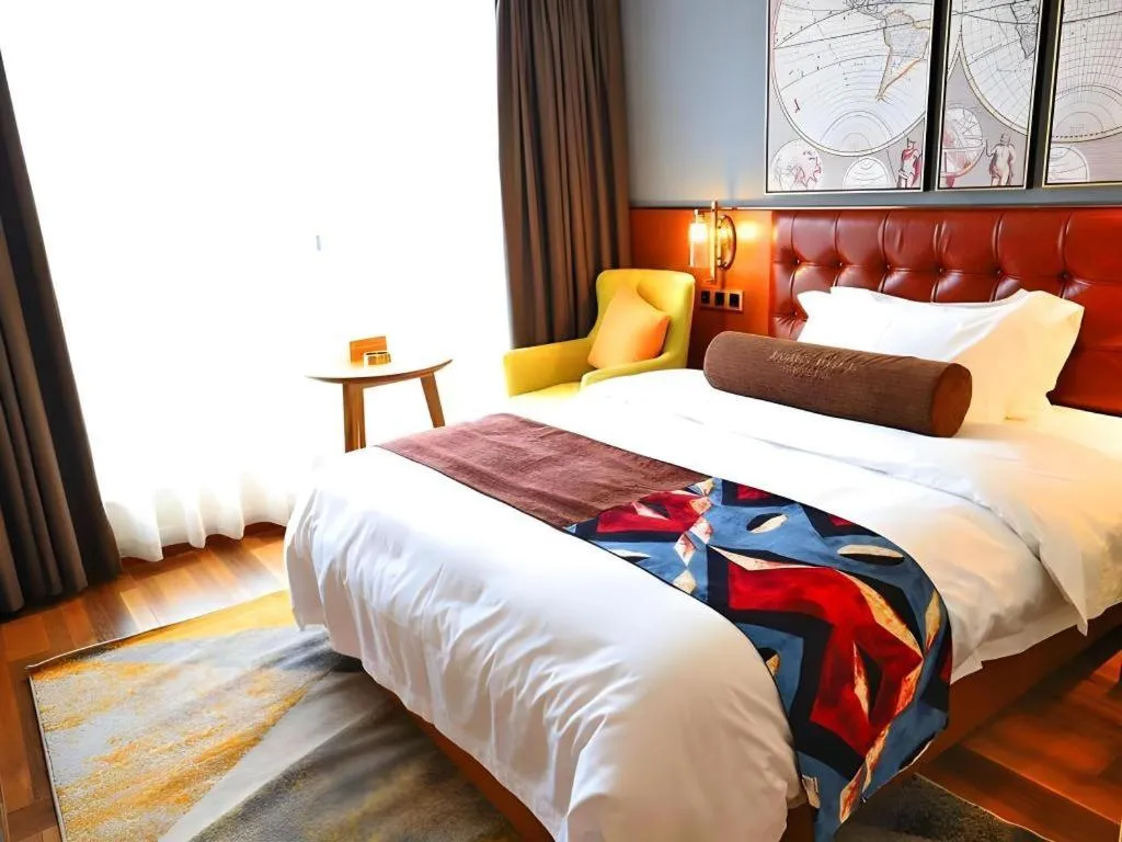 Bed in James Joyce Coffetel Guangyuan High-Speed Railway Station Dongba Municipal Government