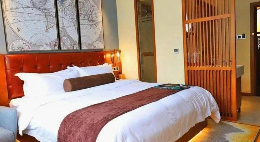 Bed in James Joyce Coffetel Guangyuan High-Speed Railway Station Dongba Municipal Government