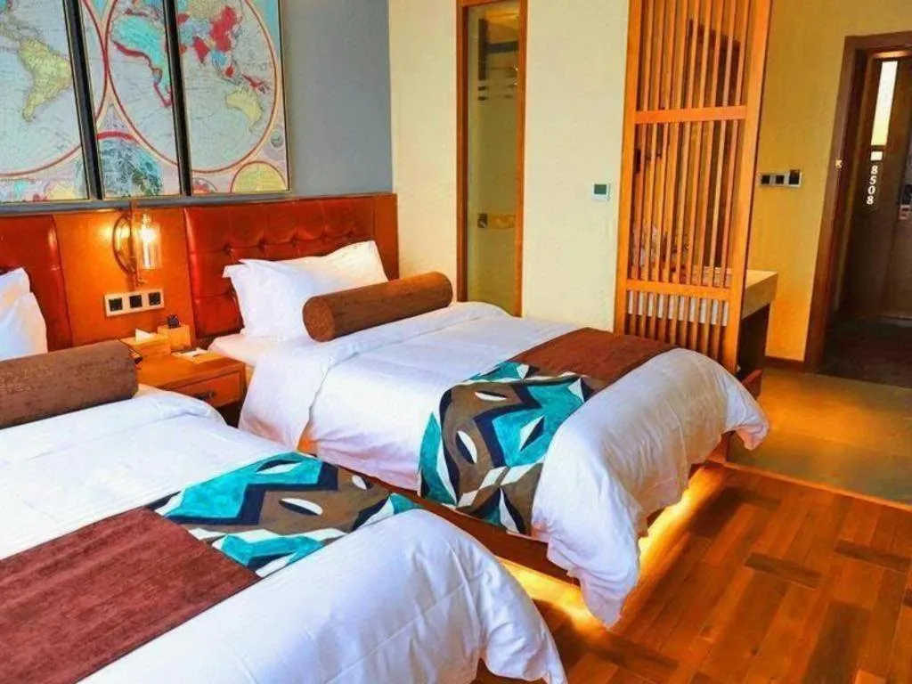 Bed in James Joyce Coffetel Guangyuan High-Speed Railway Station Dongba Municipal Government