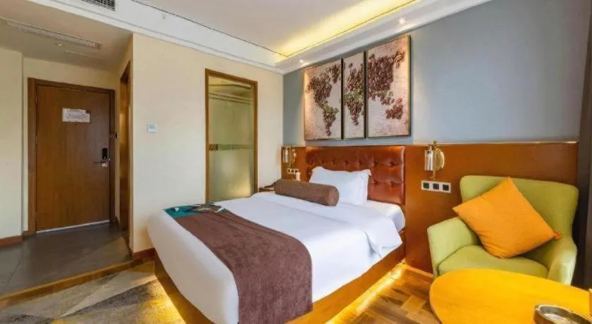 Bed in James Joyce Coffetel Guangyuan High-Speed Railway Station Dongba Municipal Government