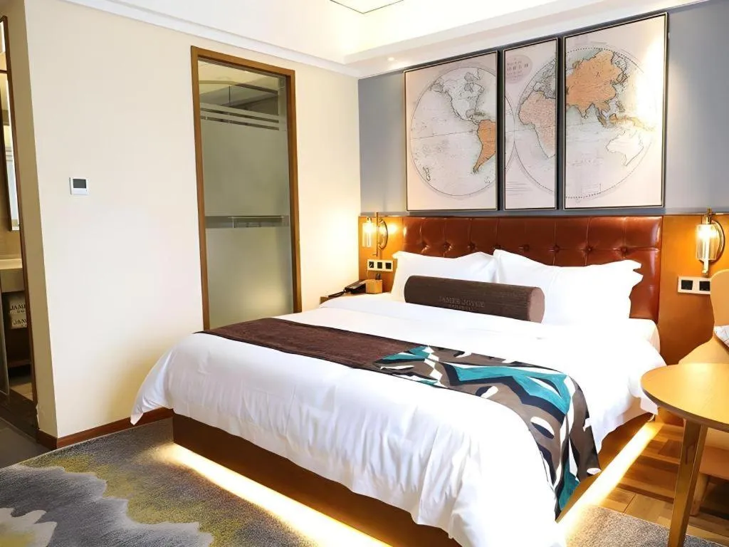 Bed in James Joyce Coffetel Guangyuan High-Speed Railway Station Dongba Municipal Government