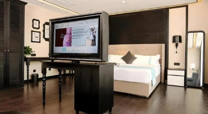 Bed in Xana Hotelle·Ji'nan Hi-tech Zone Century Avenue Tangye