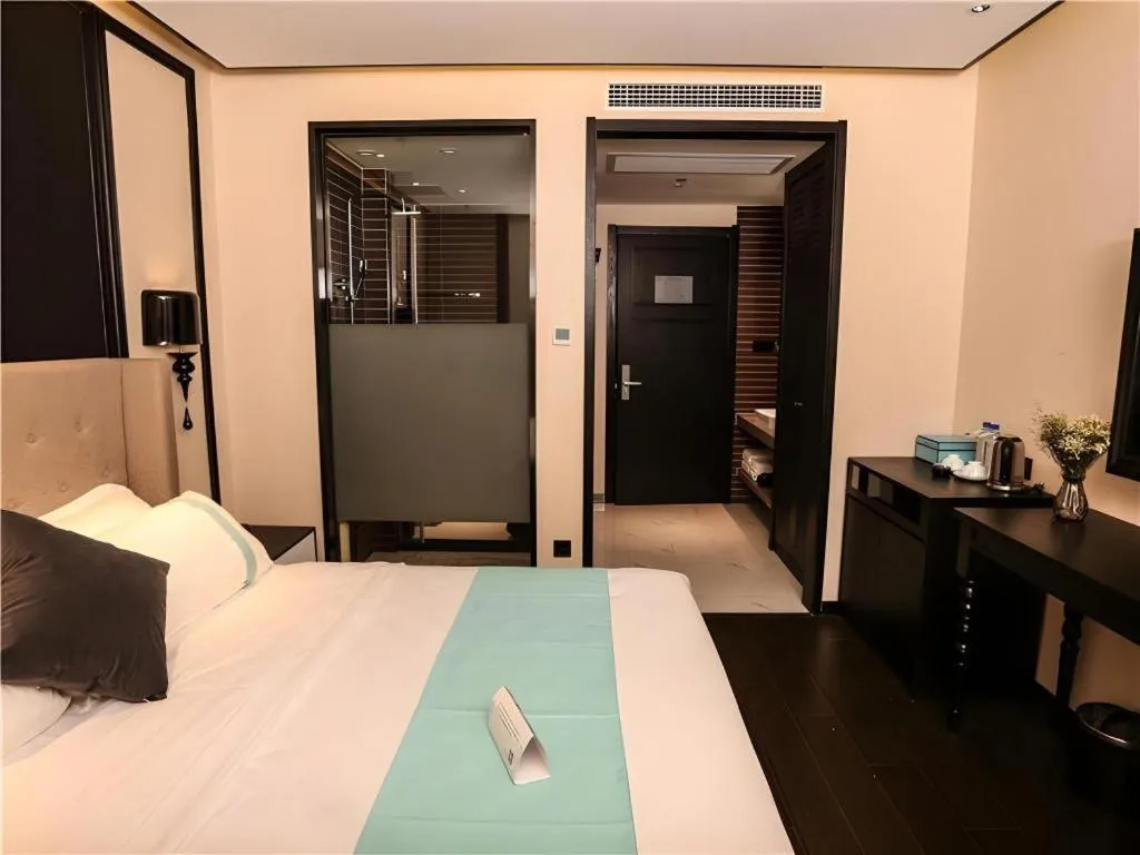 Bed in Xana Hotelle·Ji'nan Hi-tech Zone Century Avenue Tangye