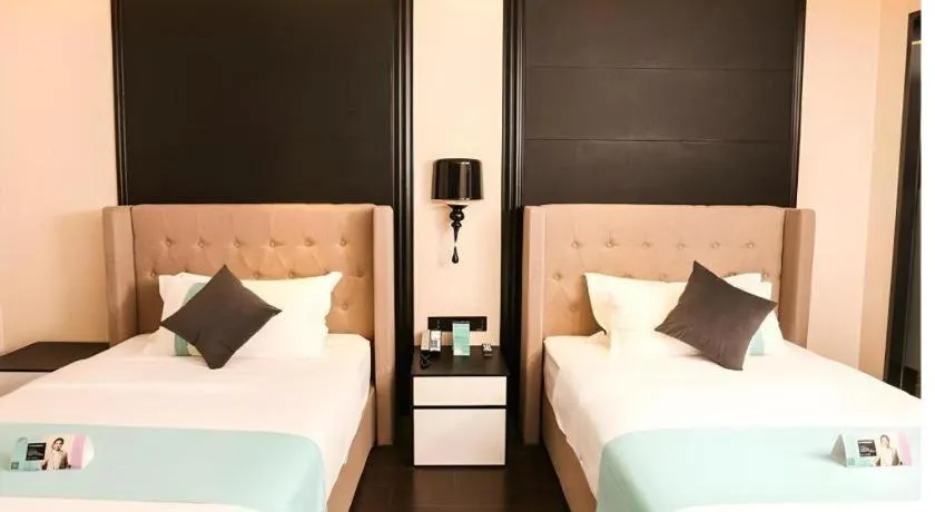 Bed in Xana Hotelle·Ji'nan Hi-tech Zone Century Avenue Tangye