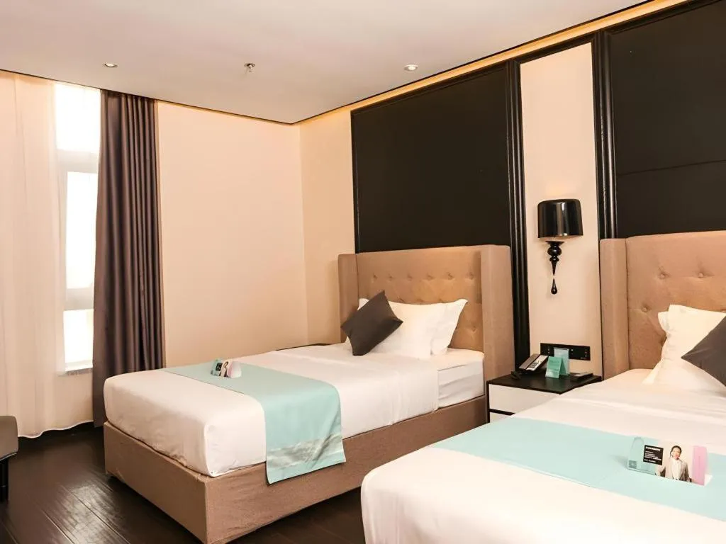 Bed in Xana Hotelle·Ji'nan Hi-tech Zone Century Avenue Tangye