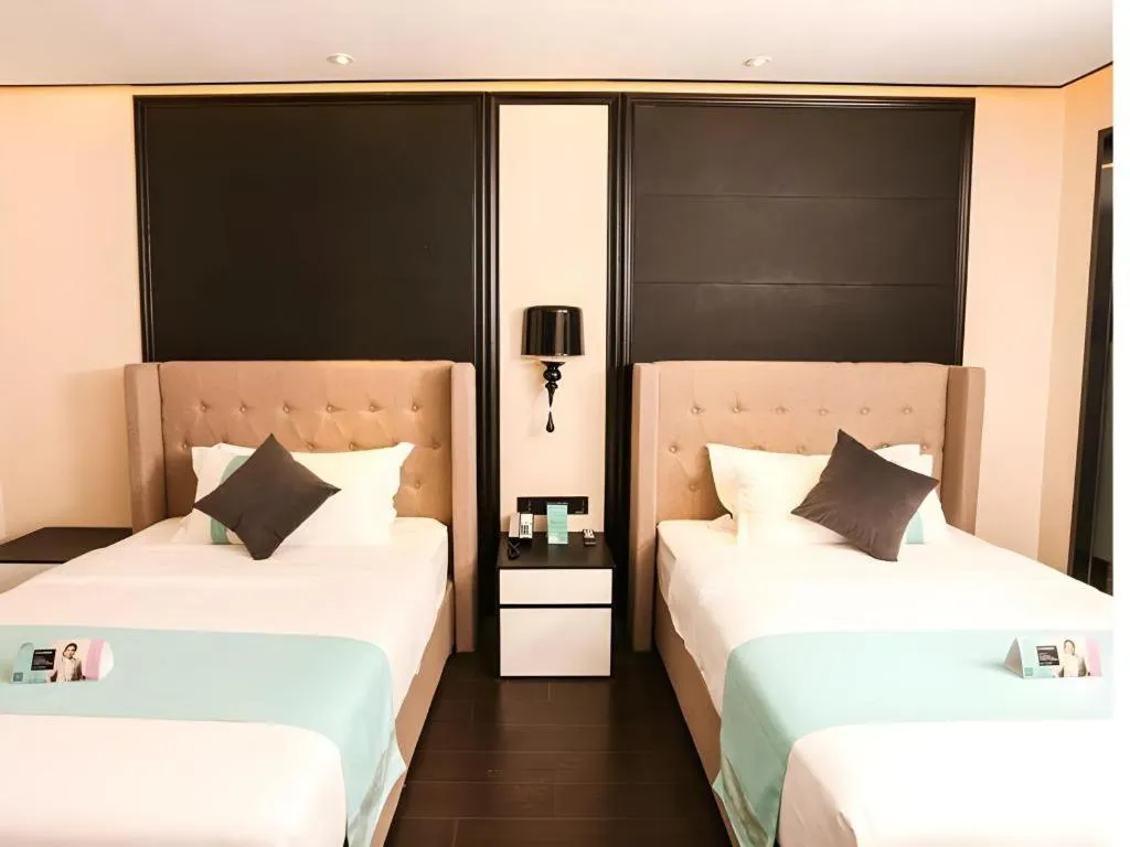 Bed in Xana Hotelle·Ji'nan Hi-tech Zone Century Avenue Tangye