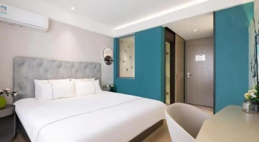 Bed in Magnotel Hotel Dandong Railway Yalv River