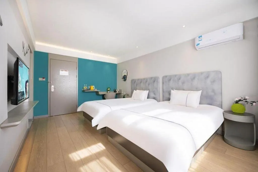 Bed in Magnotel Hotel Dandong Railway Yalv River