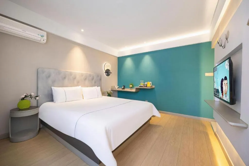 Bed in Magnotel Hotel Dandong Railway Yalv River