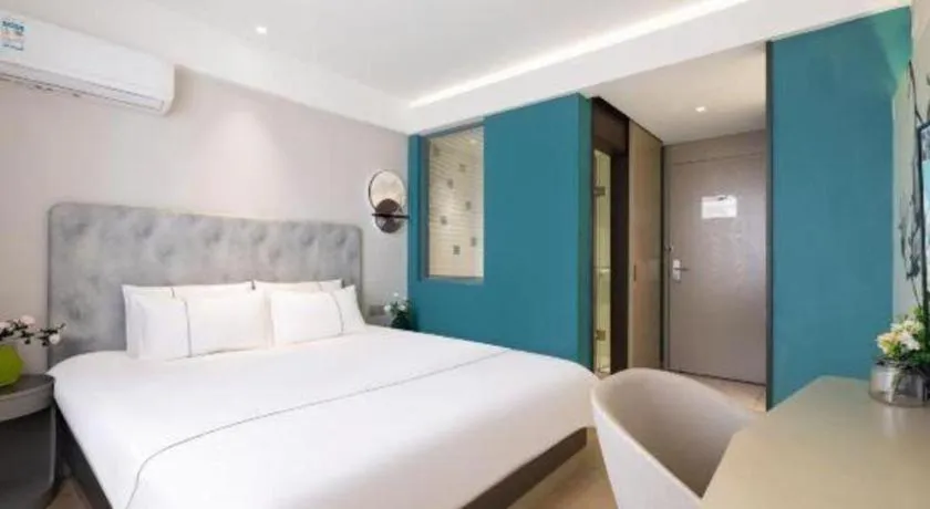 Bed in Magnotel Hotel Dandong Railway Yalv River