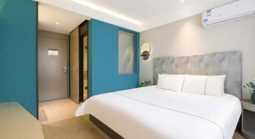 Bed in Magnotel Hotel Dandong Railway Yalv River