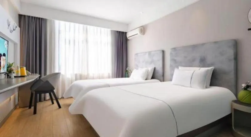 Bed in Magnotel Hotel Dandong Railway Yalv River