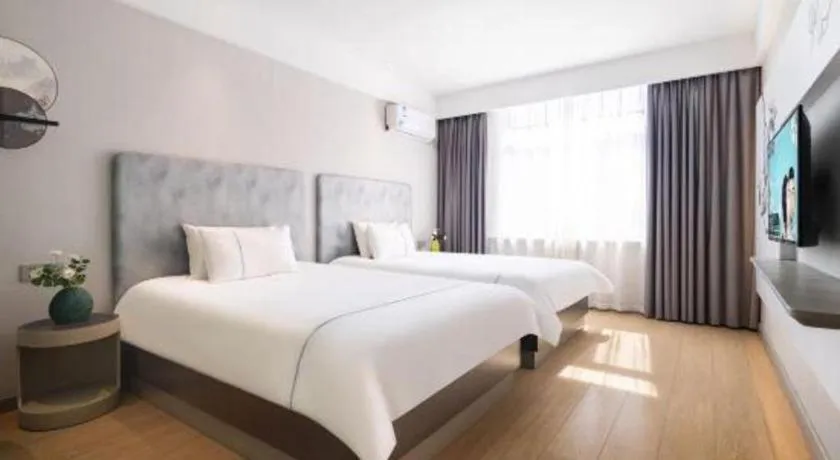 Bed in Magnotel Hotel Dandong Railway Yalv River