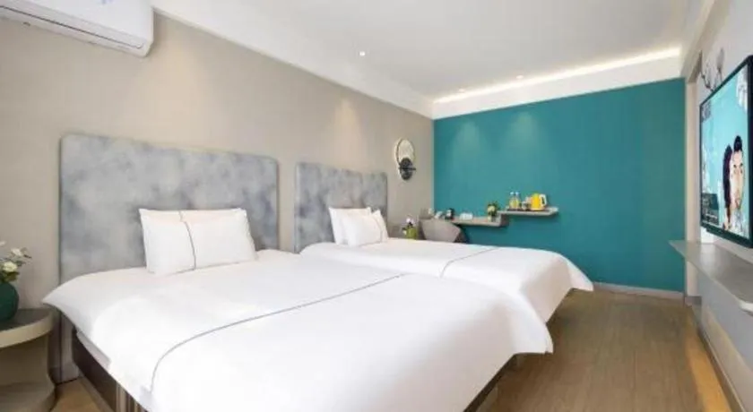 Bed in Magnotel Hotel Dandong Railway Yalv River