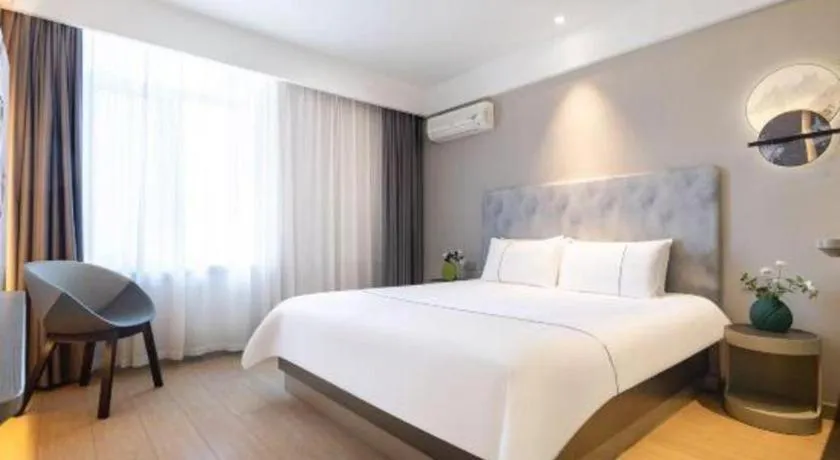 Bed in Magnotel Hotel Dandong Railway Yalv River