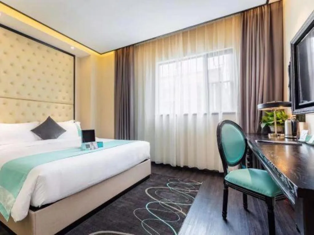 Bed in Xana Hotelle·Guangzhou Shangxiajiu Yongqingfang Changshou Road Metro Station