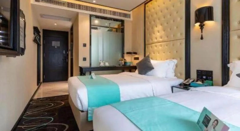 Bed in Xana Hotelle·Guangzhou Shangxiajiu Yongqingfang Changshou Road Metro Station