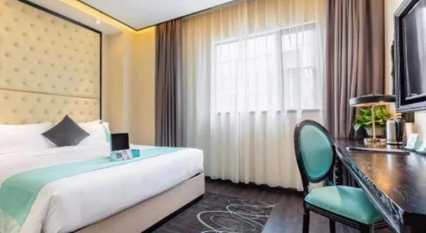 Bed in Xana Hotelle·Guangzhou Shangxiajiu Yongqingfang Changshou Road Metro Station