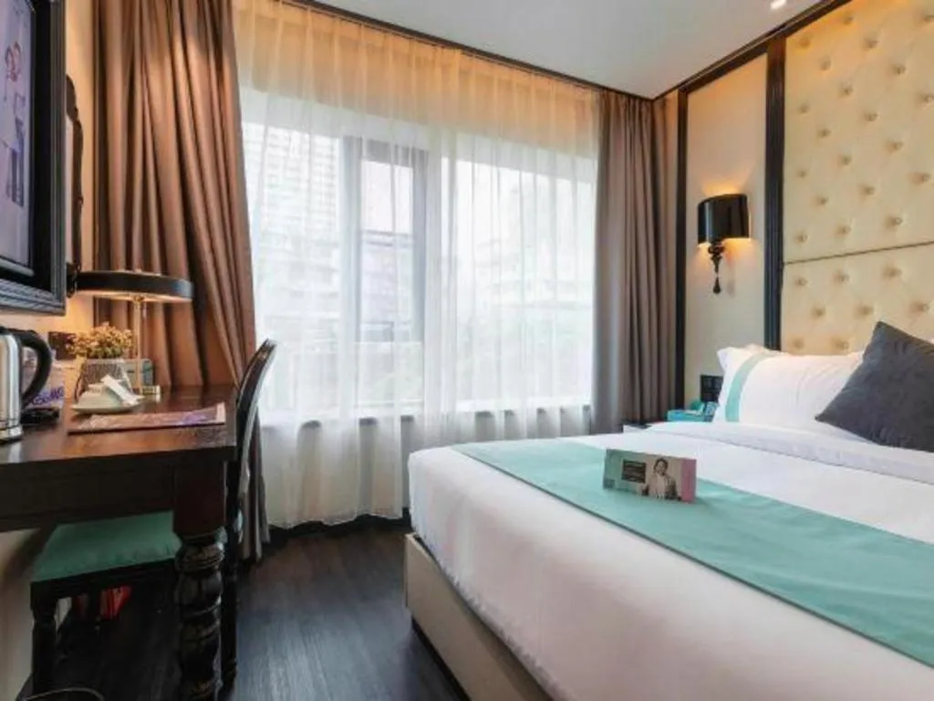 Bed in Xana Hotelle·Guangzhou Shangxiajiu Yongqingfang Changshou Road Metro Station