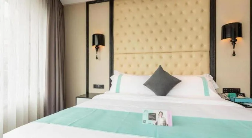 Bed in Xana Hotelle·Guangzhou Shangxiajiu Yongqingfang Changshou Road Metro Station