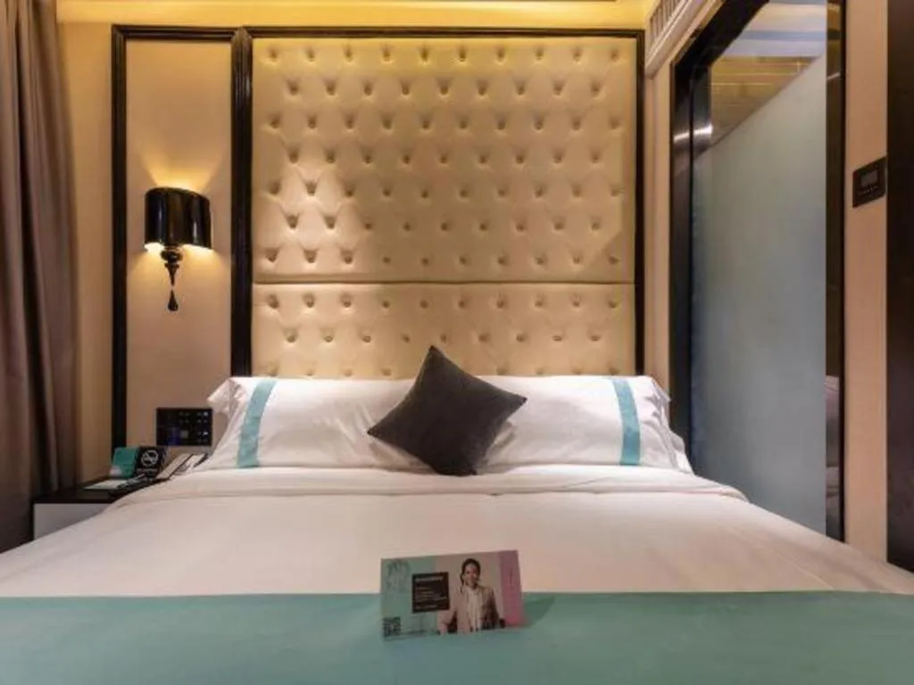 Bed in Xana Hotelle·Guangzhou Shangxiajiu Yongqingfang Changshou Road Metro Station