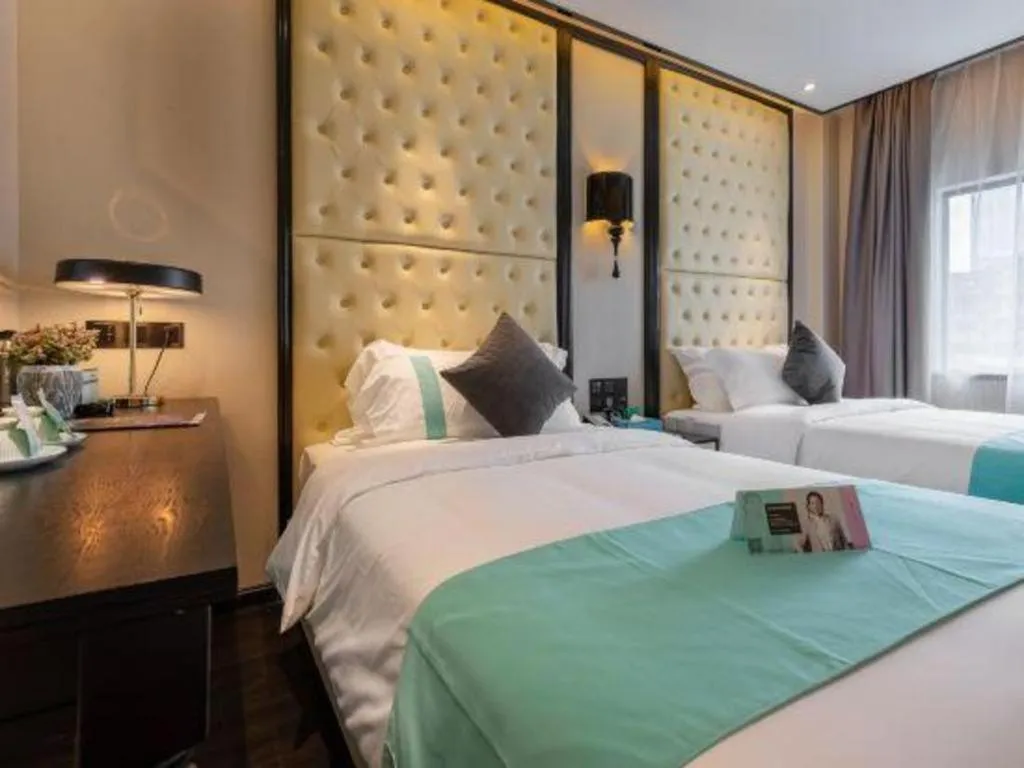 Bed in Xana Hotelle·Guangzhou Shangxiajiu Yongqingfang Changshou Road Metro Station