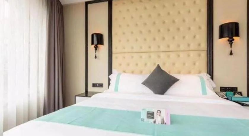 Bed in Xana Hotelle·Guangzhou Shangxiajiu Yongqingfang Changshou Road Metro Station